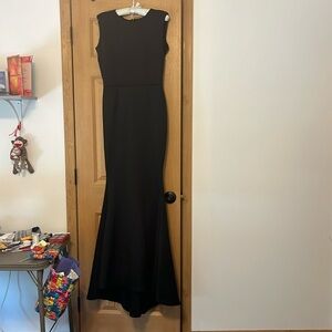 Black medium formal sleeveless mermaid dress. Elegant and timeless.